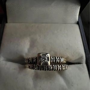 This was given to me by my mom. I know it’s gold, but I’m unaware of the diamond